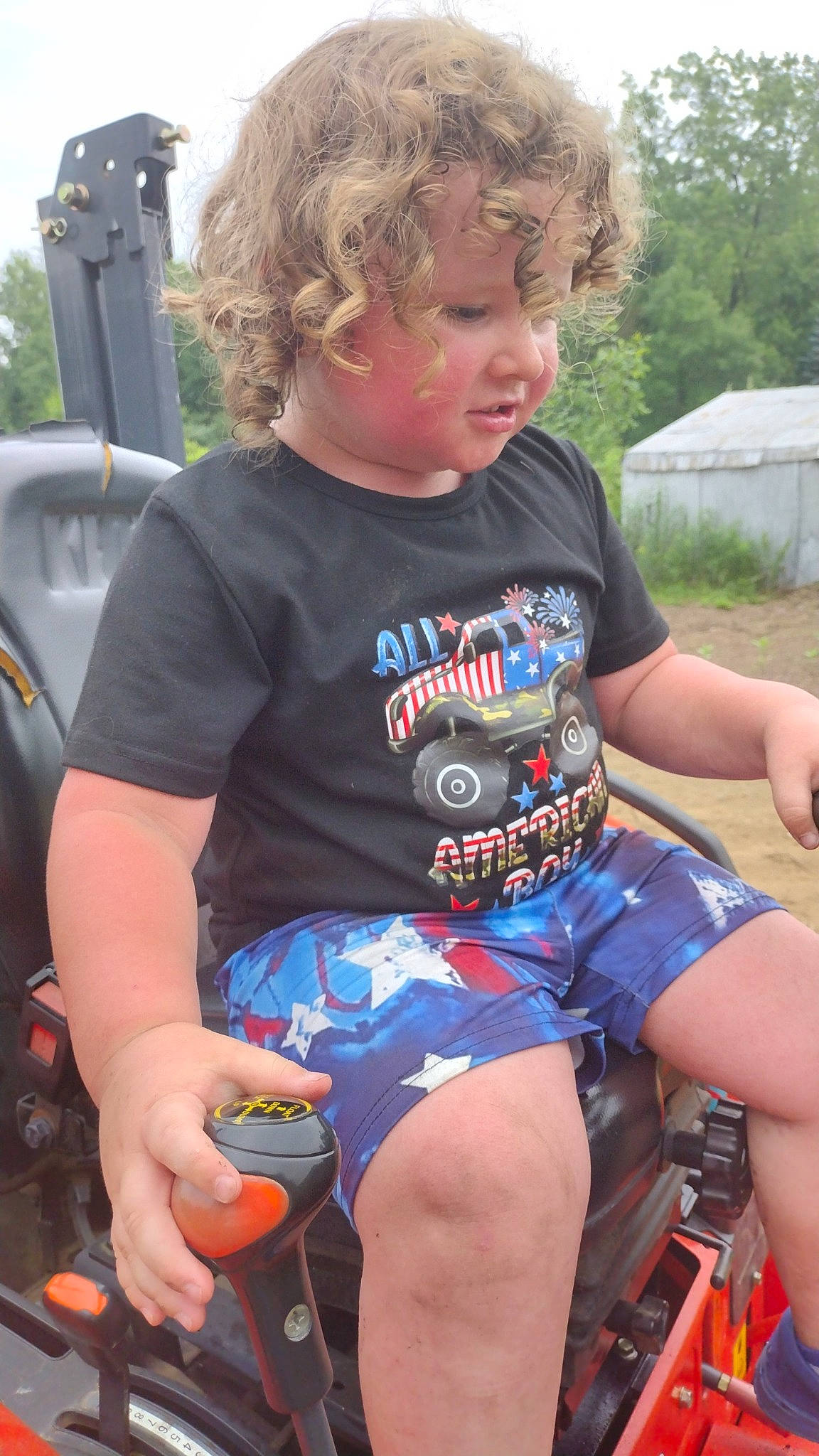 Caleb Charles joined the competition — help win amazing prizes! bicycle_handlebar, bicycles_equipment_and_supplies, child, cool, finger, fun, grass, hairstyle, lap, leisure, motor_vehicle, muscle, person, recreation, shorts, summer, t_shirt, thigh, toddler, tree