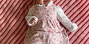 Bella-Rose joined the competition — help win amazing prizes! baby, infant, smiling, floral_dress, white_tights, pink_slippers, striped_blanket, laying_down, happy, cute, child, portrait, indoors, soft_texture, cozy, small_hands, small_feet, head, face, clothing