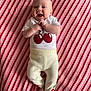 Bella-Rose joined the competition — help win amazing prizes! baby, child, smiling, happy, infant, clothing, shirt, pants, cherries, blanket, striped, fabric, cute, lying_down, hands, feet, portrait, indoor, person, cozy