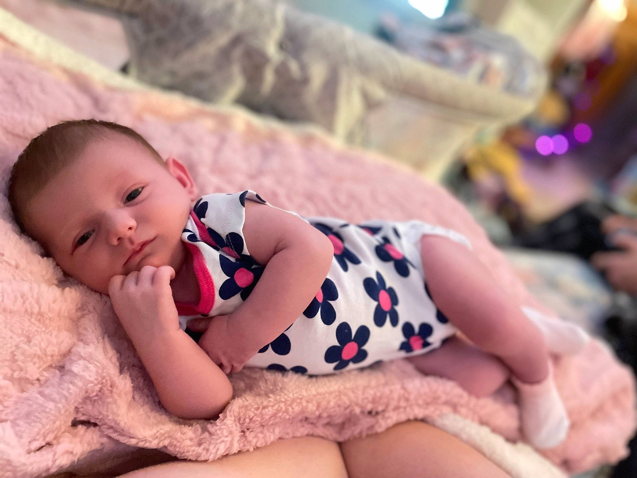 Paisley joined the competition — help win amazing prizes! baby, baby_toddler_clothing, child, comfort, eye, fashion_accessory, grass, happy, headband, human_leg, linens, nail, pattern, person, photo_shoot, pink, portrait_photography, sitting, skin, thigh