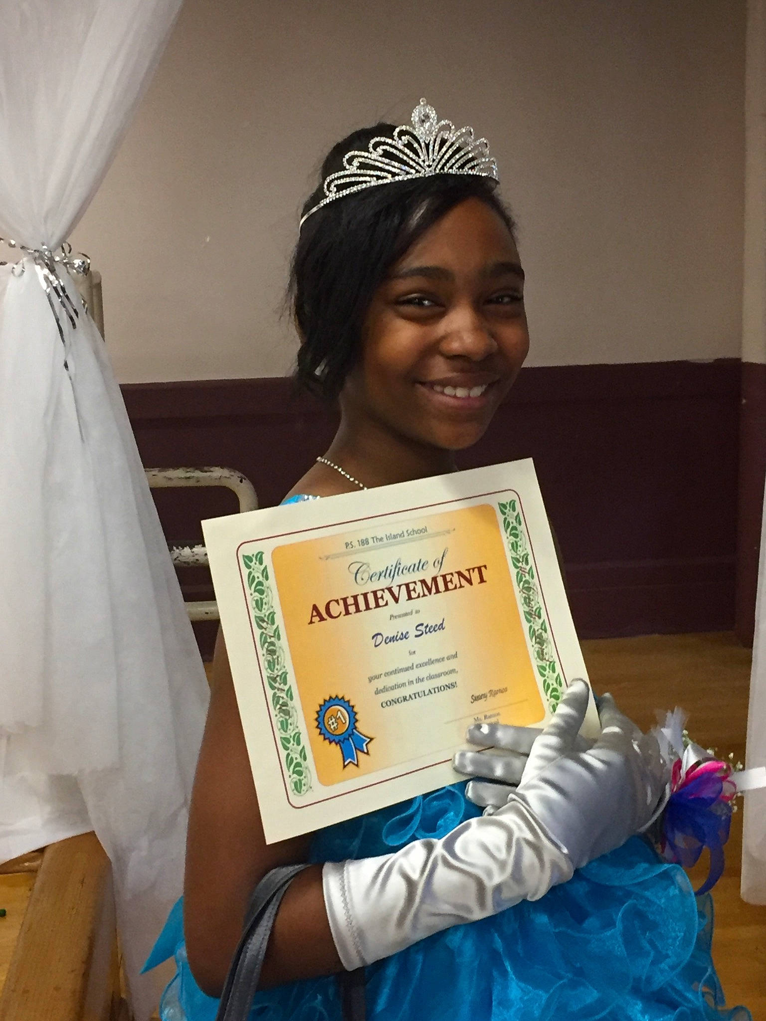 Denise is registered to the contest to win money with this photo: child, headwear, joy, person, smile