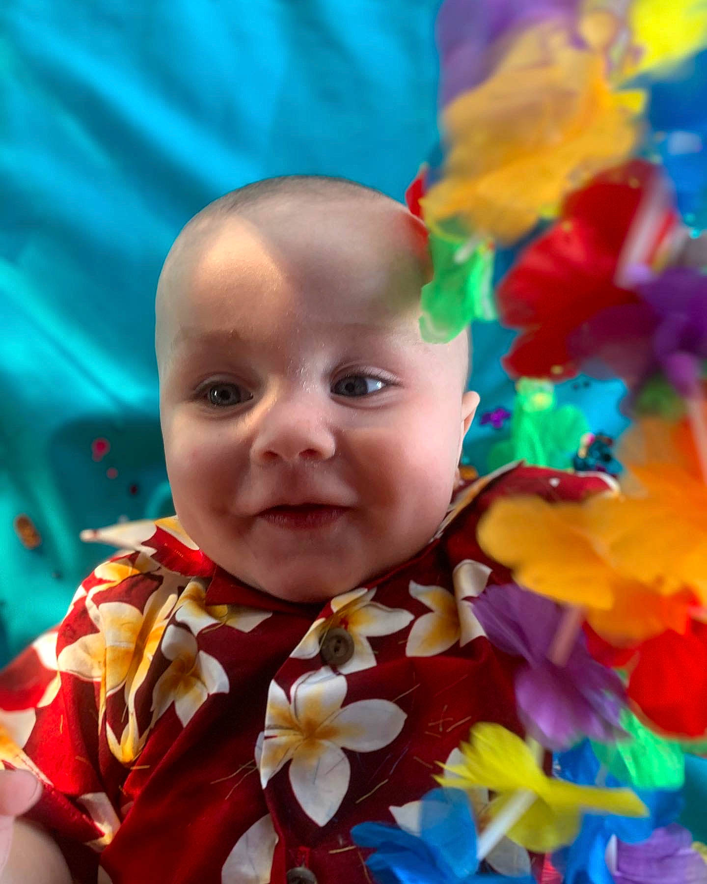 Aziel is registered to the contest to win money with this photo: baby, beauty, child, close_up, dress, event, eye, fashion_accessory, flowering_plant, fun, grass, happy, magenta, orange, people_in_nature, person, petal, pink, plant, textile