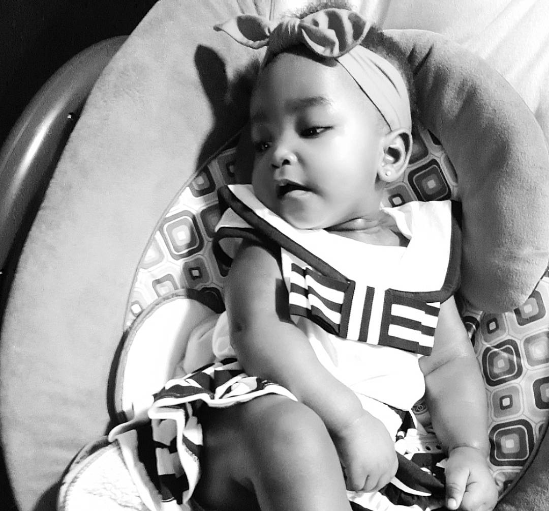 Shantal joined the competition — help win amazing prizes! baby, baby_products, baby_toddler_clothing, black, black_and_white, child, comfort, flash_photography, happy, headpiece, monochrome, monochrome_photography, pattern, person, personal_protective_equipment, sitting, sports_gear, style, thigh, toddler