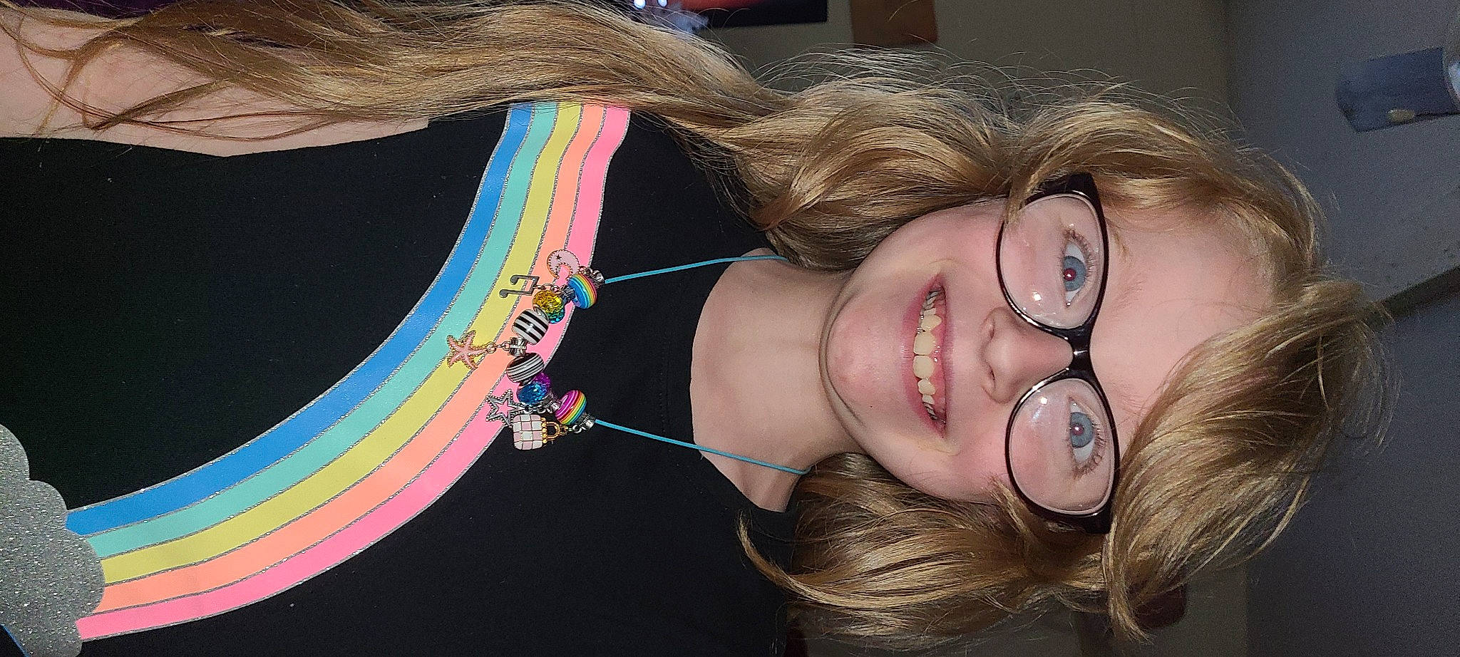 Wednesday is registered to the contest to win money with this photo: bangs, black_hair, chin, cool, ear, earrings, eyebrow, eyelash, eyewear, flash_photography, glasses, happy, jaw, joy, lip, mouth, neck, nose, person, skin