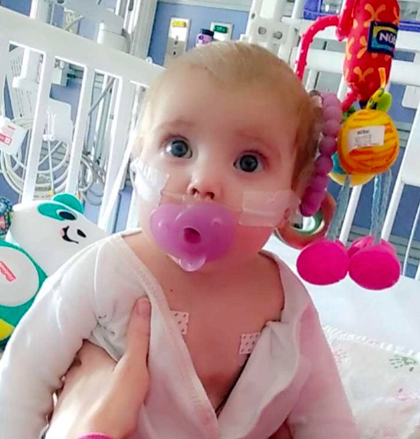 Teagan joined the competition — help win amazing prizes! baby, baby_products, baby_toddler_clothing, cheek, chest, child, eyelash, finger, fun, gesture, happy, magenta, mouth, nail, nose, person, pink, skin, surprise, thumb