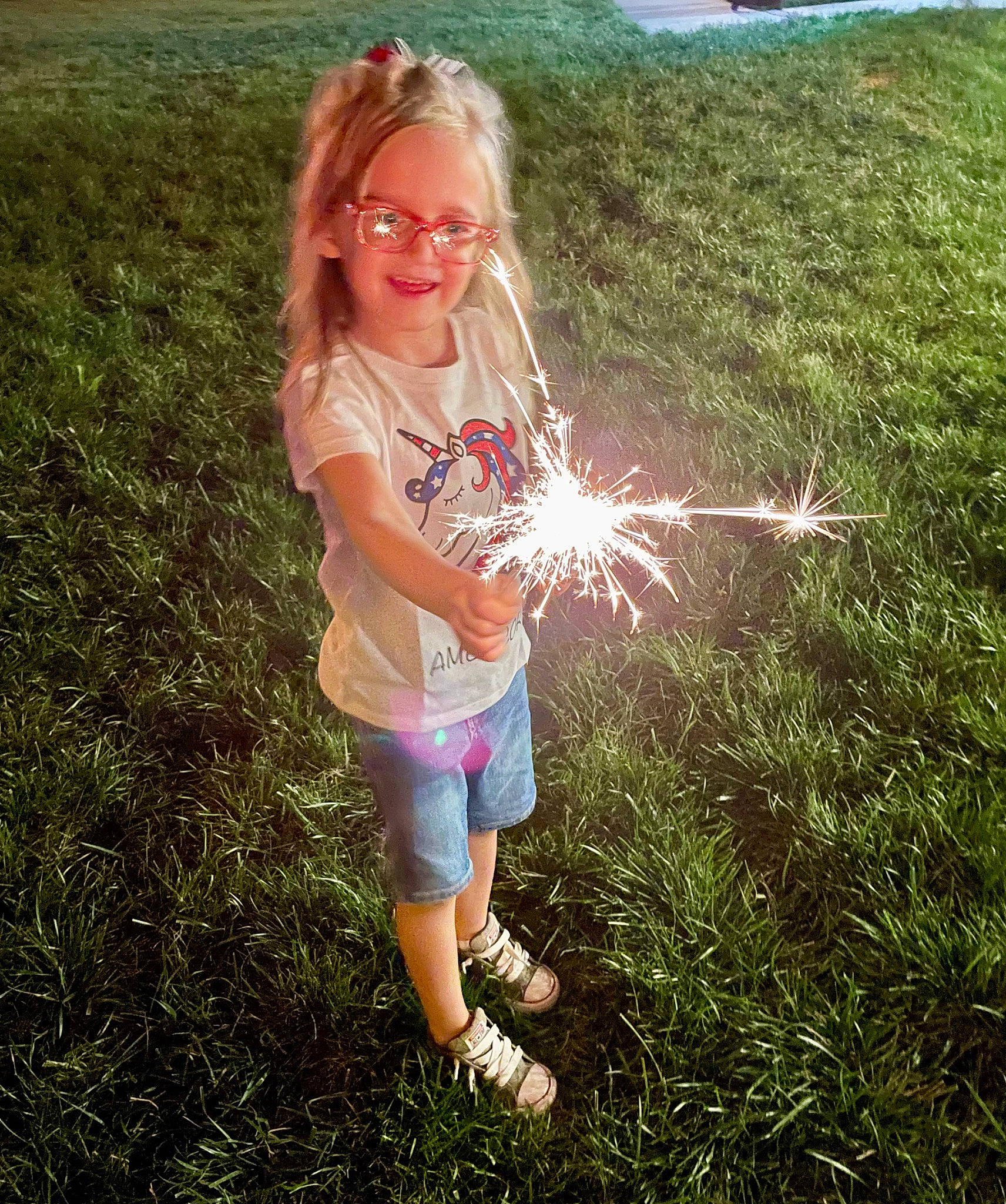 Aubreigh joined the competition — help win amazing prizes! child, fireworks, fun, grass, grass_family, grassland, happy, head, joy, lawn, light, meadow, people_in_nature, person, shorts, smile, summer, sunglasses, sunlight, t_shirt