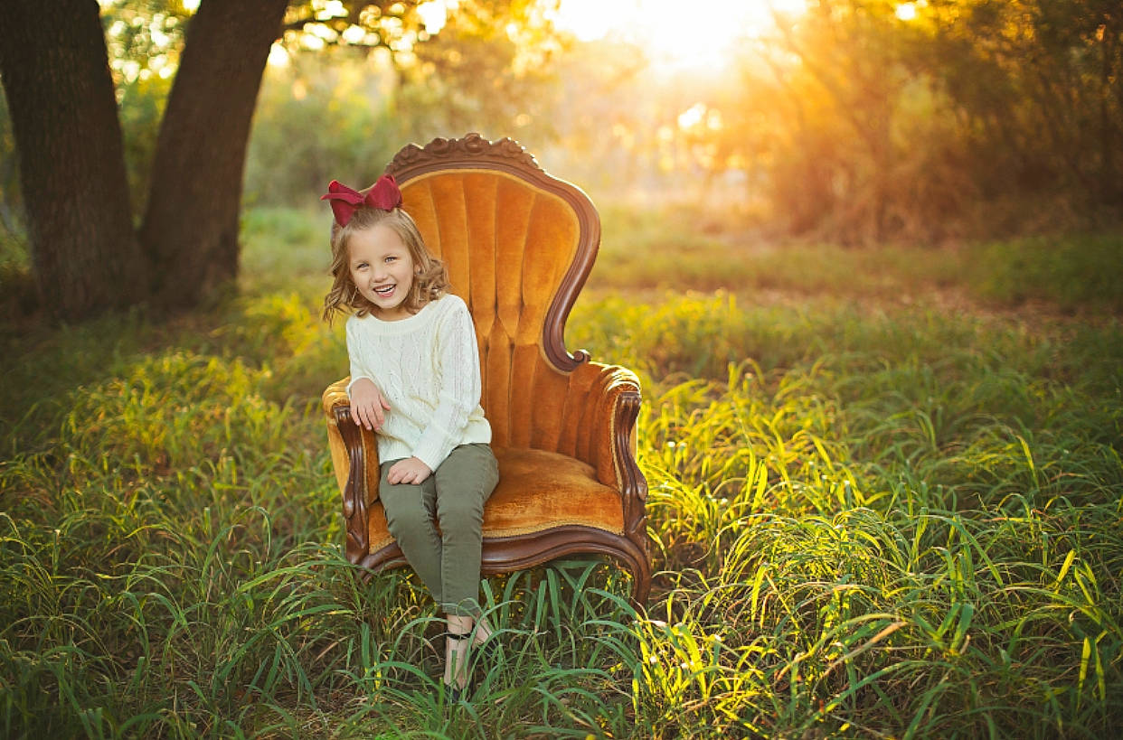 Kalleigh joined the competition — help win amazing prizes! child, forest, fun, grass, happy, joy, leaf, light, meadow, natural_landscape, people_in_nature, person, photograph, photography, portrait, portrait_photography, sitting, smile, sunlight, toddler