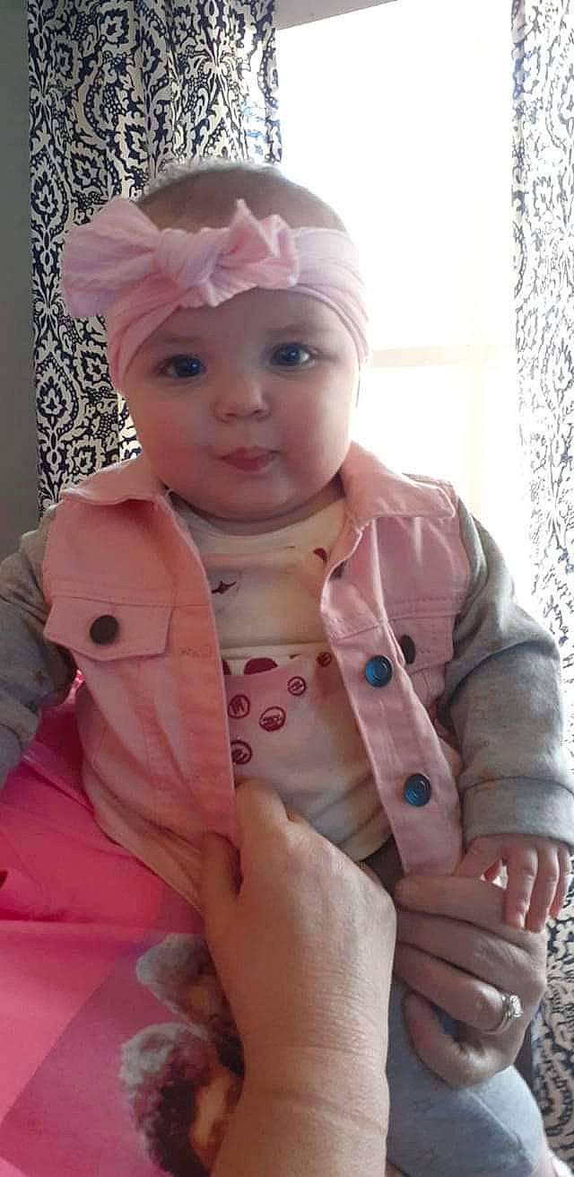 Raegan is registered to the contest to win money with this photo: baby, child, doll, peach, person, pink, toddler, toy