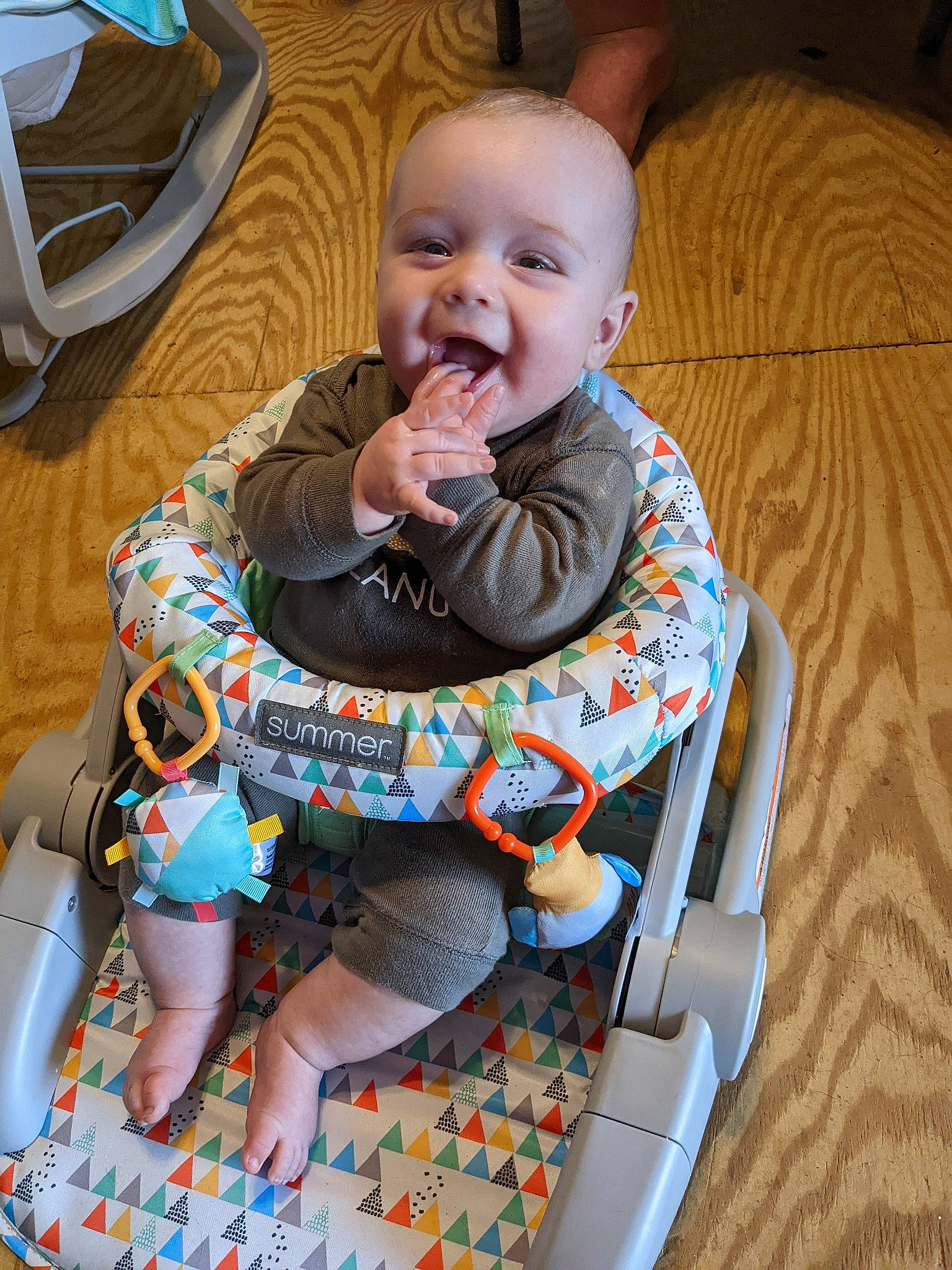 Colson is registered to the contest to win money with this photo: baby, baby_products, baby_safety, baby_toddler_clothing, chair, cheek, child, comfort, eye, face, fun, head, lap, mouth, person, product, room, sitting, skin, smile