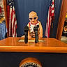 Sage joined the competition — help win amazing prizes! toddler, child, sunglasses, microphone, podium, flag, american_flag, white_house, commander_in_chief, politics, patriotic, indoor, public_speaking, government, official, person, portrait, blue_background, red_white_blue, cute