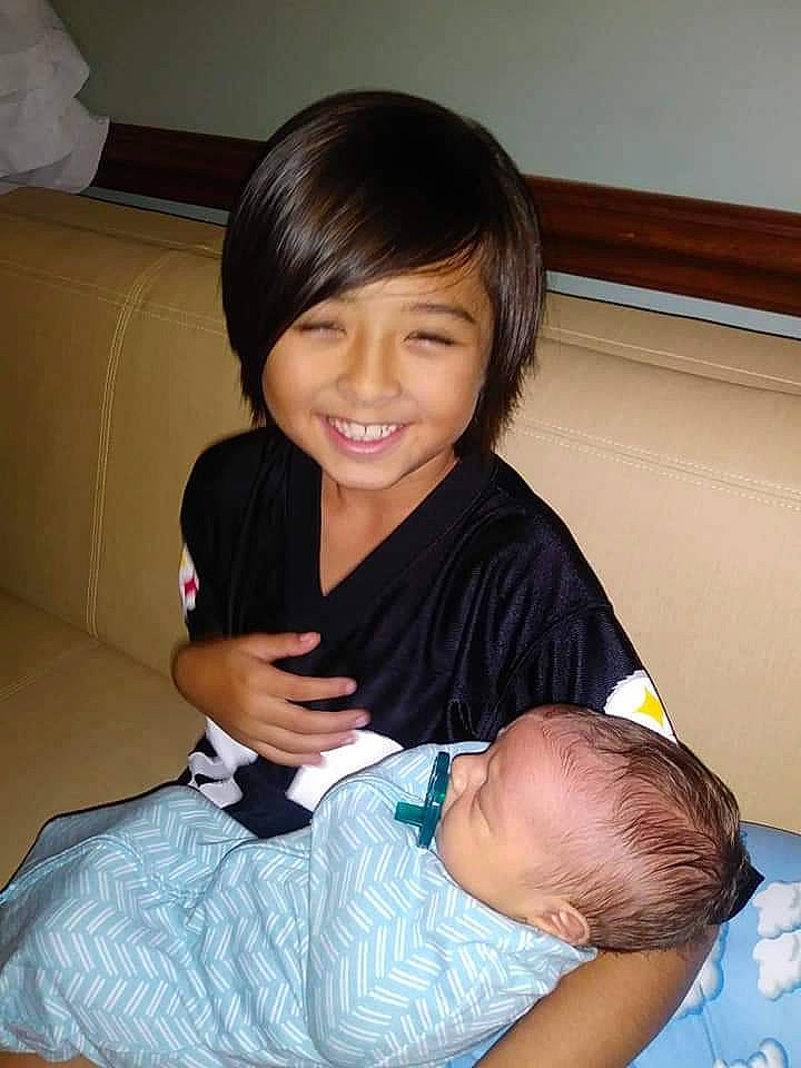 Jasmine joined the competition — help win amazing prizes! arm, black_hair, child, joy, person, sitting