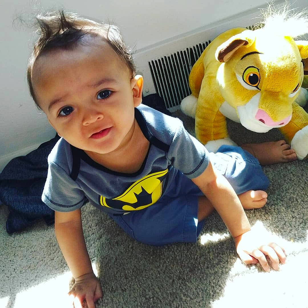 Shakeem is registered to the contest to win money with this photo: baby, child, cool, ear, eye, face, fun, happy, head, nose, person, play, plush, selfie, skin, smile, stuffed_toy, t_shirt, toddler, toy