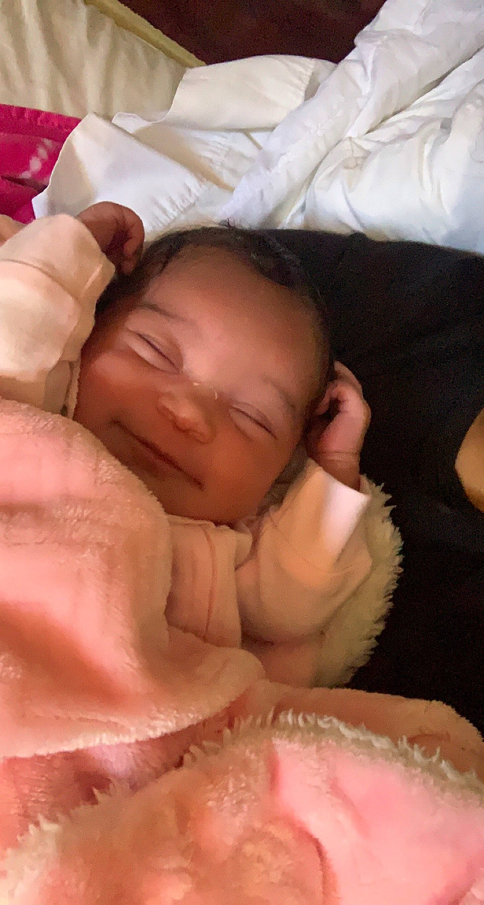 Zoey is registered to the contest to win money with this photo: abdomen, baby, baby_sleeping, baby_toddler_clothing, cheek, chin, comfort, eye, eyebrow, face, finger, head, iris, lip, mouth, nose, person, pink, skin, thumb