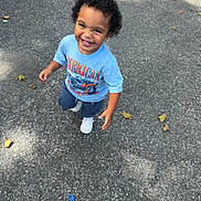 Jahquinn joined the competition — help win amazing prizes! child, toddler, smiling, curly_hair, portrait, outdoor, road, asphalt, autumn, leaves, blue_shirt, shorts, sneakers, standing, happy, playful, daylight, casual_clothing, single_person, photography