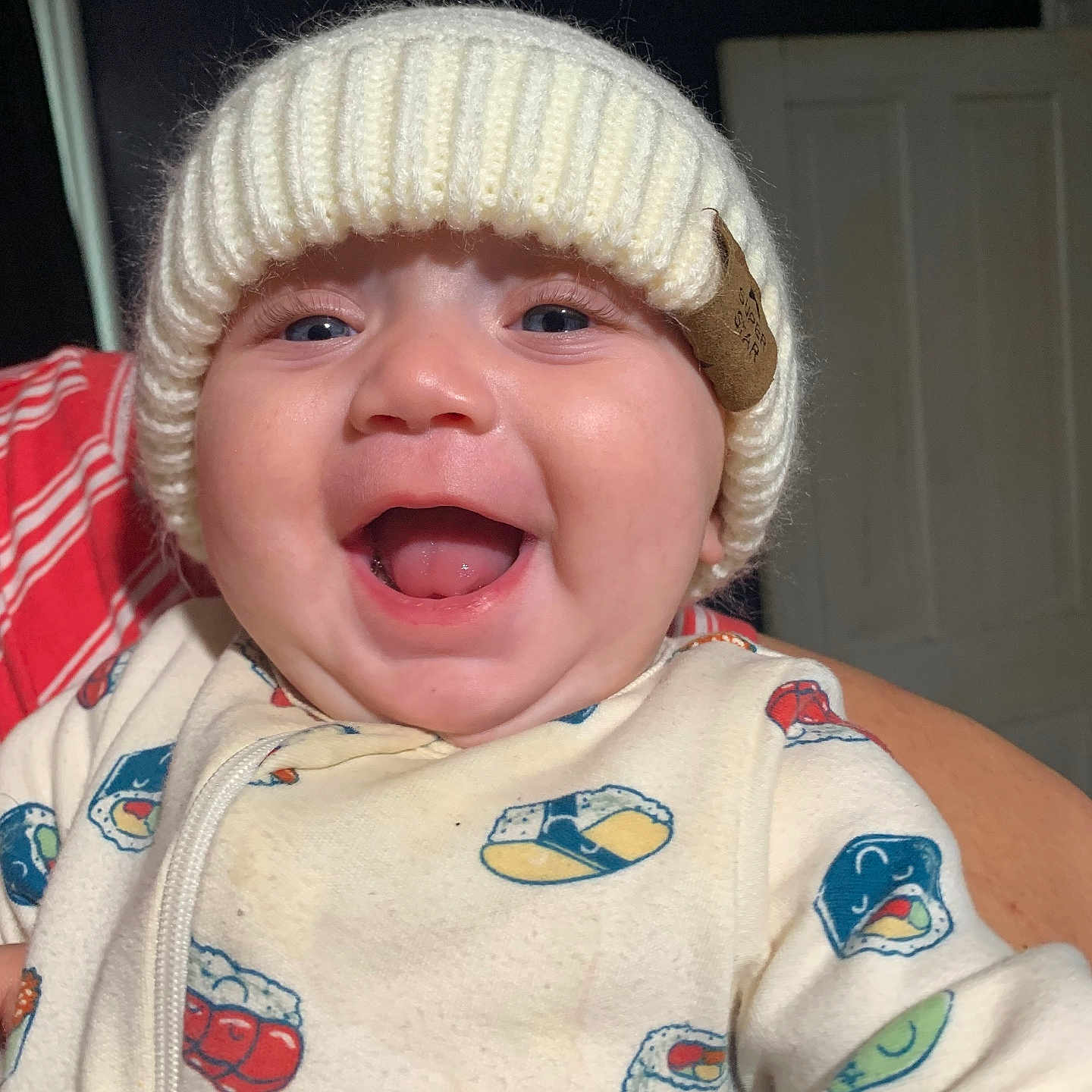 Zillah is registered to the contest to win money with this photo: baby, babylaughing, beanie, bonnet, cap, clothing, coat, crying, face, happy, hat, head, jacket, knitwear, laughing, person, photography, portrait, sad, sweater