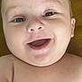baby, smiling, face, eyes, skin, infant, child, happy, closeup, portrait, expression, mouth, nose, cheeks, hair, bare_shoulders, background, texture, lying_down, cute