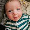Jimmy joined the competition — help win amazing prizes! baby, infant, face, eyes, striped_clothing, onesie, child, cute, portrait, closeup, smile, expression, soft_blanket, cozy, indoors, young, skin, head, hair, person