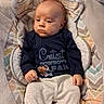 Montie joined the competition — help win amazing prizes! baby, baby_seat, child, clothing, comfortable, cushion, cute, face, head, indoor, infant, navy_shirt, newborn, pants, patterned_fabric, person, resting, serious_expression, small_hands, soft_texture