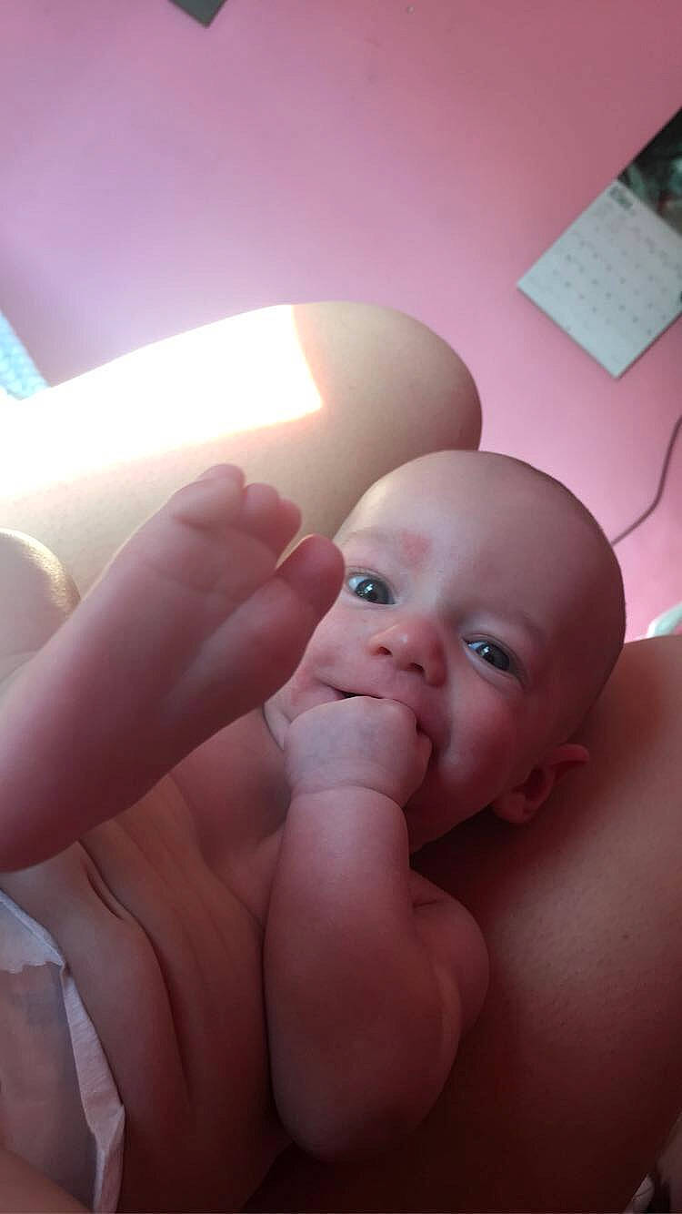 Gavin is registered to the contest to win money with this photo: baby, cheek, chest, comfort, eye, eyebrow, finger, gesture, hand, happy, head, lip, mouth, nail, nose, person, pink, skin, stomach, thumb