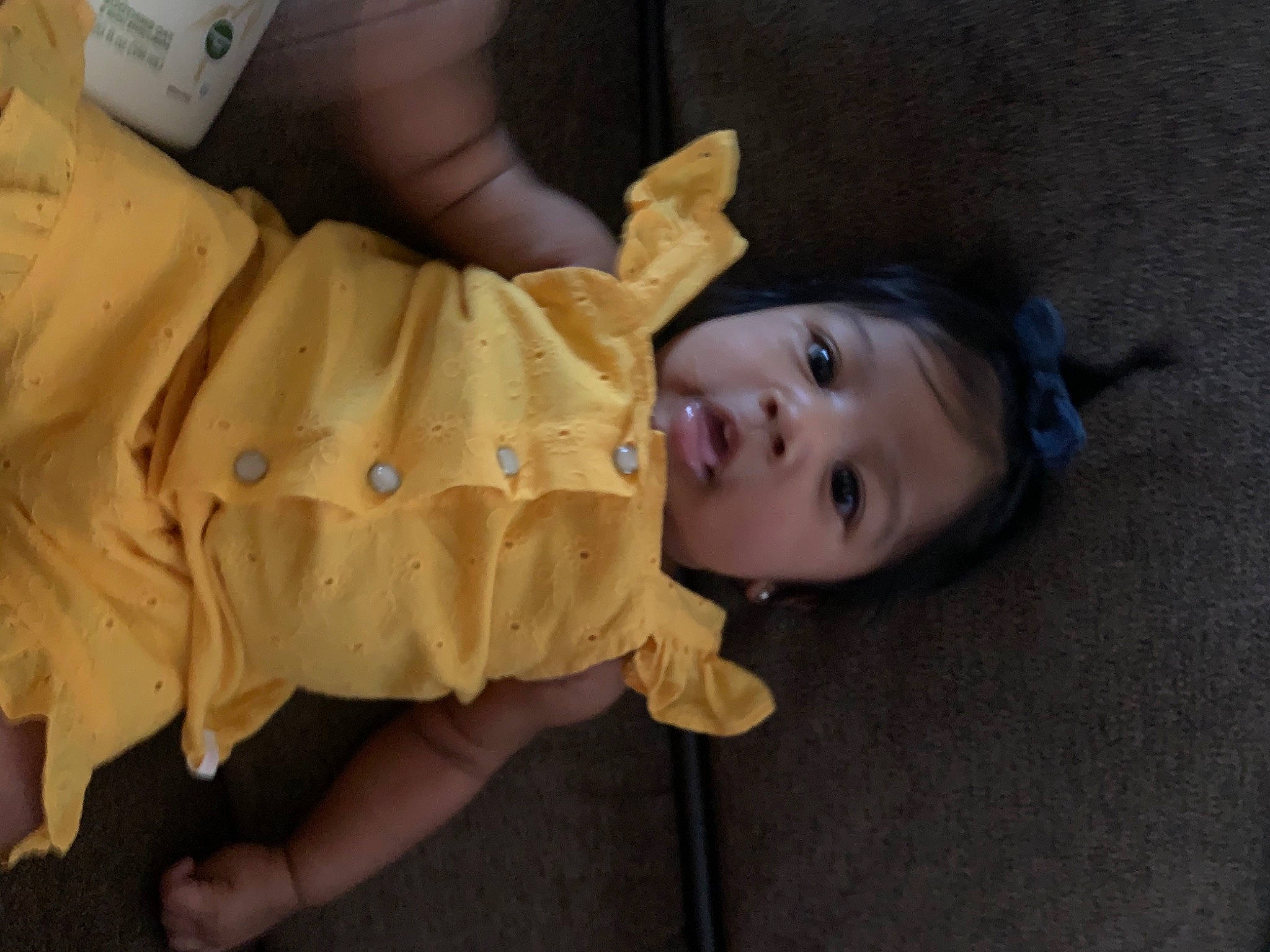 Maliayah is registered to the contest to win money with this photo: abdomen, baby, baby_toddler_clothing, cheek, child, elbow, face, finger, flooring, fun, grass, head, human_leg, nose, person, sitting, skin, sleeve, thumb, toddler