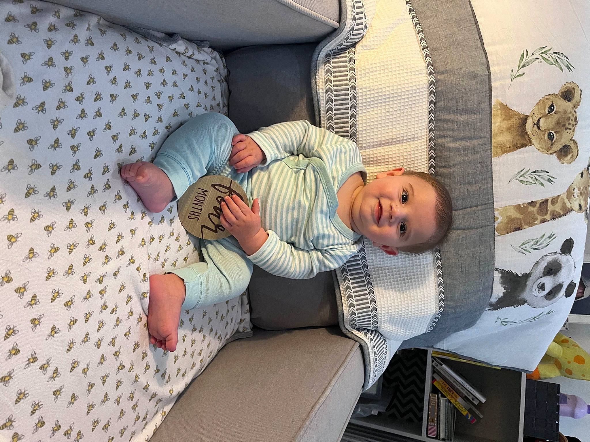 Kenneth is registered to the contest to win money with this photo: baby, baby_products, baby_safety, bedding, bedtime, child, comfort, couch, flooring, infant_bed, joy, linens, nap, pattern, person, pillow, product, room, sleep, smile