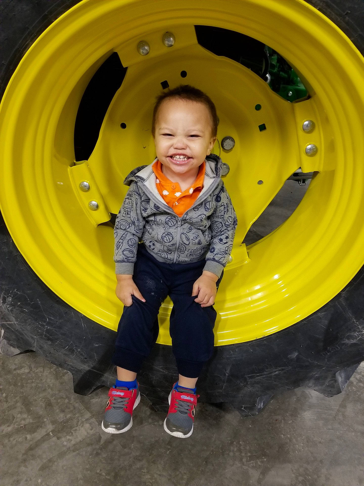 Ja'Kobi joined the competition — help win amazing prizes! automotive_tire, child, fun, girl, joy, person, product, recreation, smile, tire, toddler, wheel, yellow