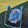 baby, baby_swing, outdoor, grass, smiling, happy, infant, child, blue_clothing, play, sunlight, nature, seat, toy, grass_field, summer, cute, person, barefoot, relaxing