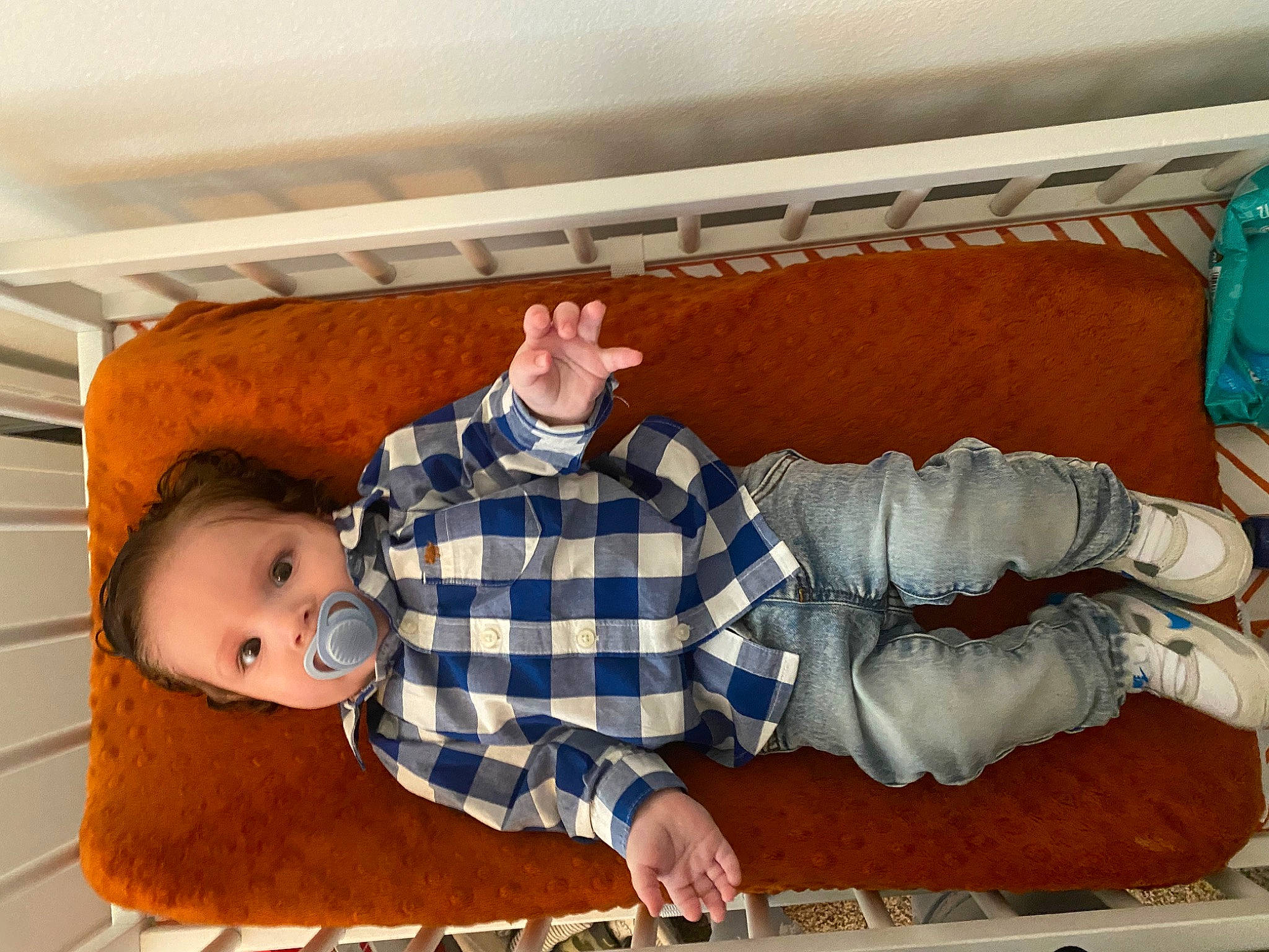 Everett is registered to the contest to win money with this photo: baby, baby_toddler_clothing, bed, bedding, child, comfort, couch, flooring, fun, lap, leisure, linens, nap, pattern, person, plaid, room, sitting, textile, toddler