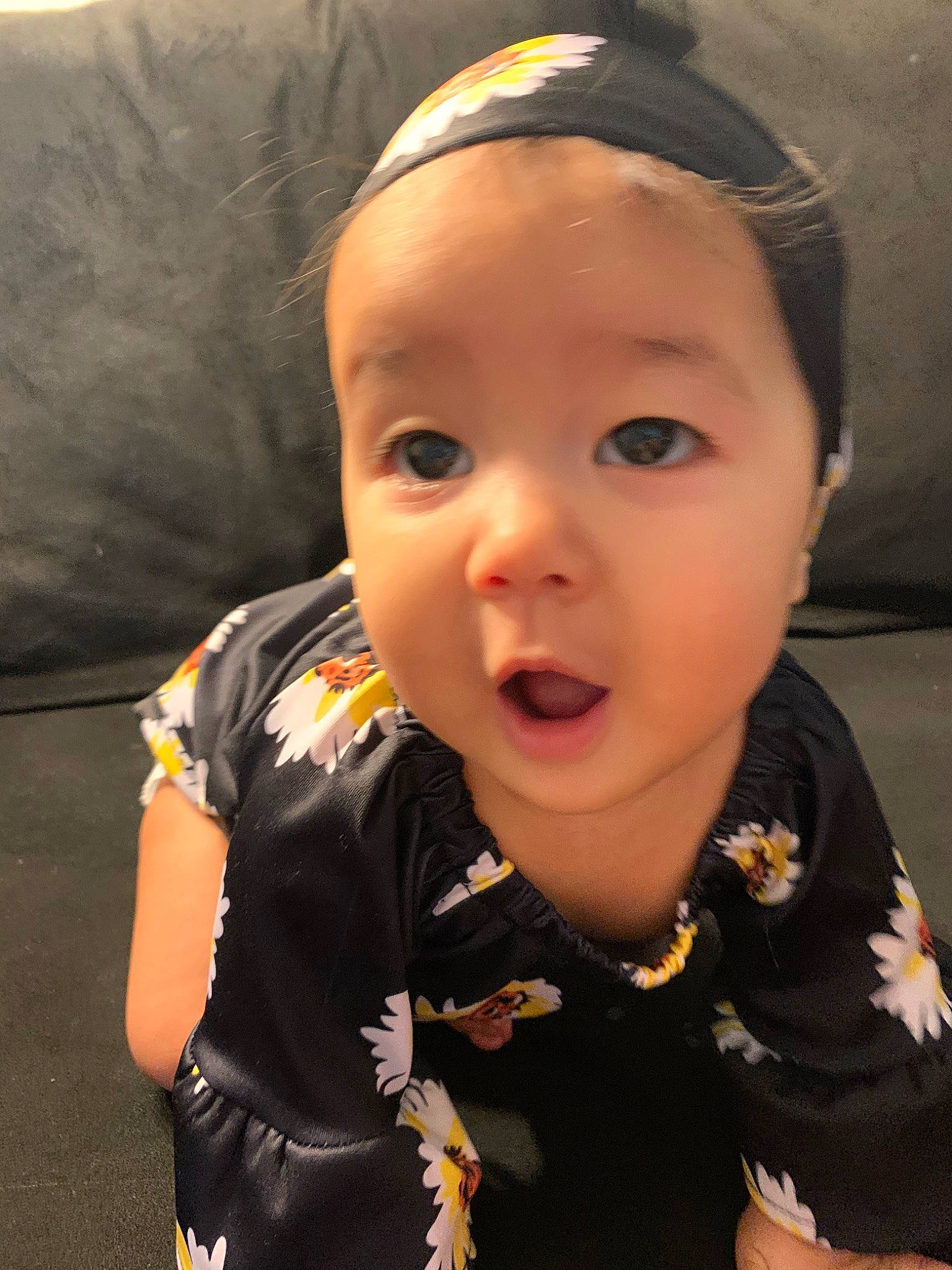 Celine joined the competition — help win amazing prizes! baby, cheek, child, chin, hair_accessory, head, headband, headgear, lip, person, skin, smile, surprise, toddler