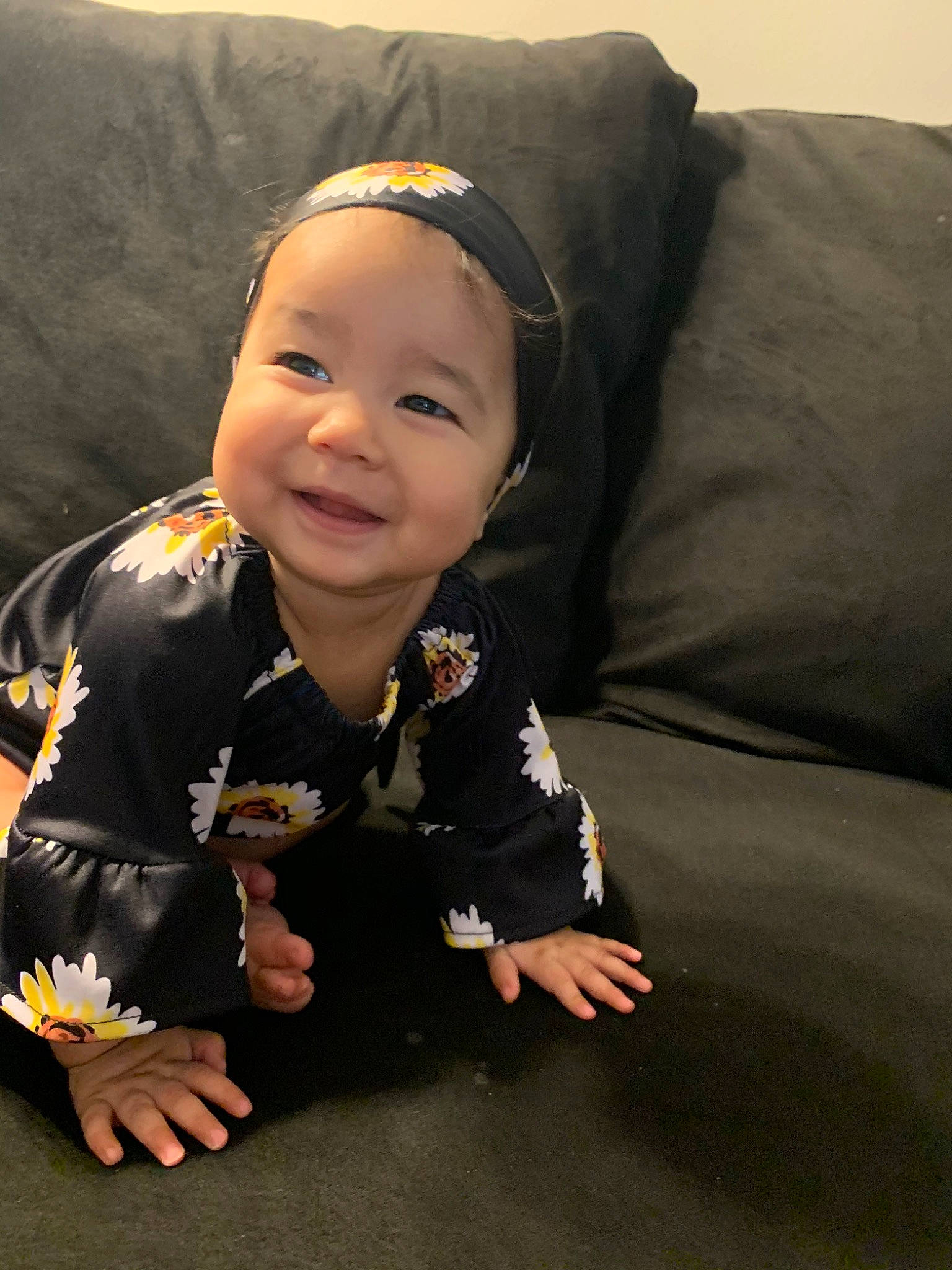 Celine joined the competition — help win amazing prizes! baby, black_hair, cheek, child, head, headwear, joy, person, sitting, skin, smile, toddler