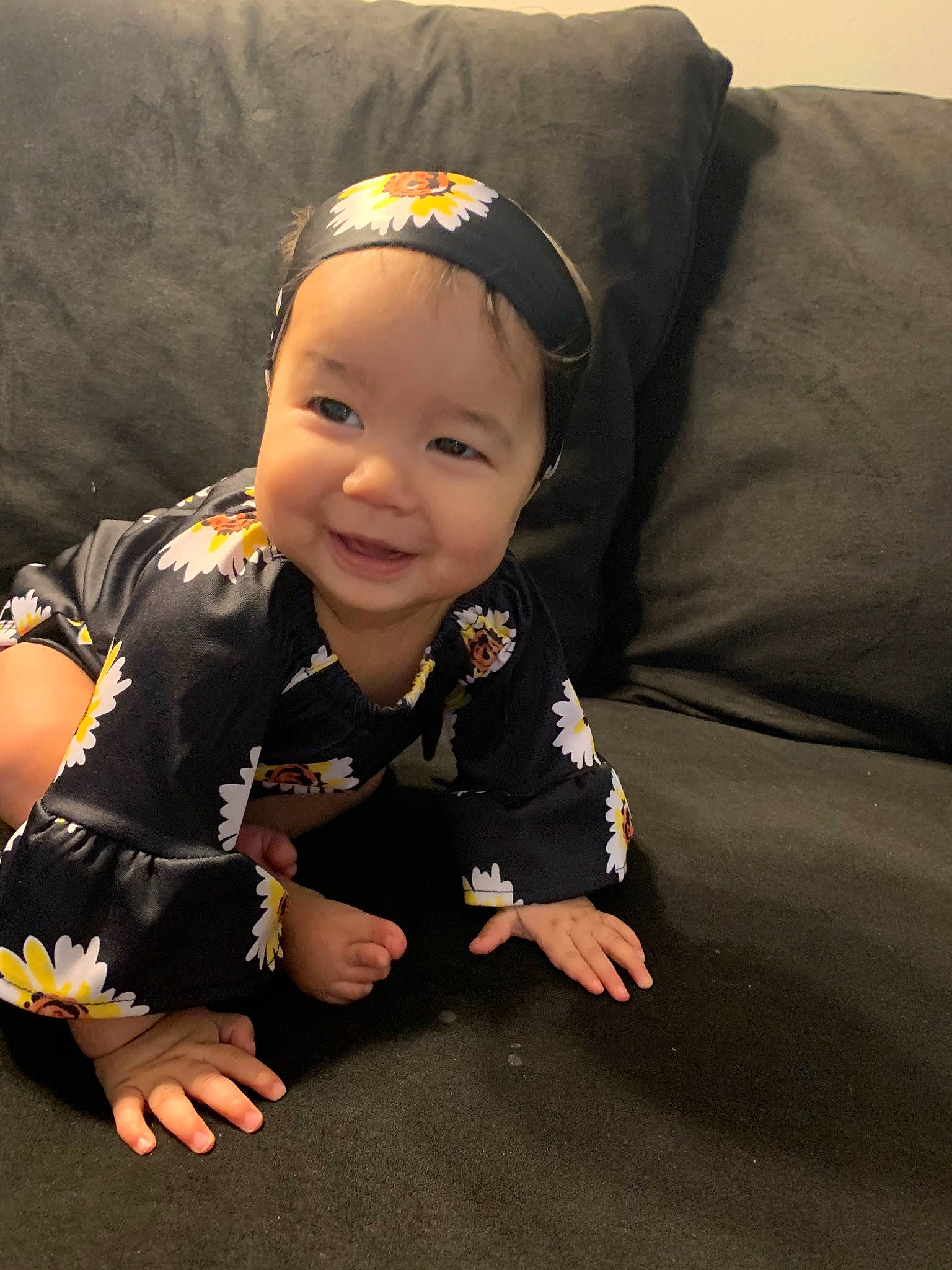 Celine is registered to the contest to win money with this photo: arm, baby, cheek, child, head, headwear, joy, person, sitting, skin, toddler