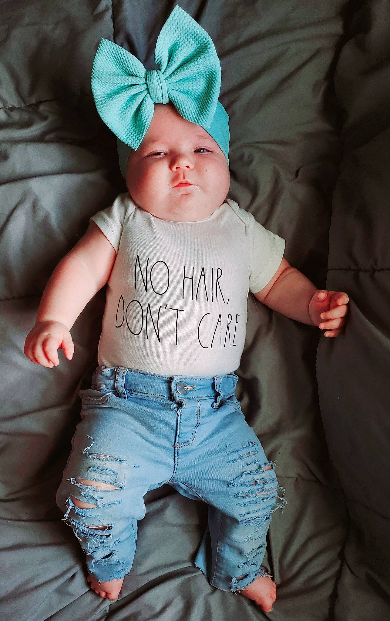 Dawson joined the competition — help win amazing prizes! arm, baby, baby_toddler_clothing, blue, comfort, eye, face, gesture, glasses, grey, hand, head, headwear, human_body, neck, outerwear, person, product, skin, sleeve