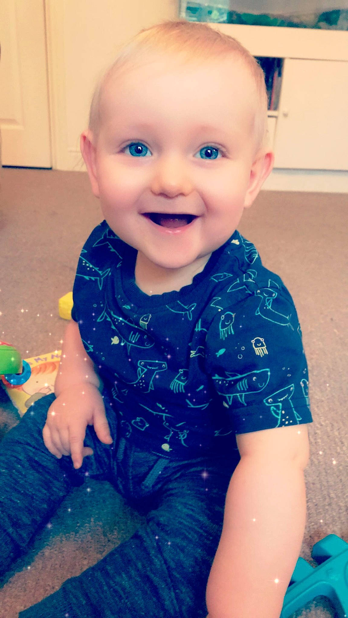 Jenson joined the competition — help win amazing prizes! azure, baby, baby_toddler_clothing, blue, cheek, child, cool, electric_blue, facial_expression, happy, iris, joy, nose, person, purple, skin, sleeve, smile, standing, summer