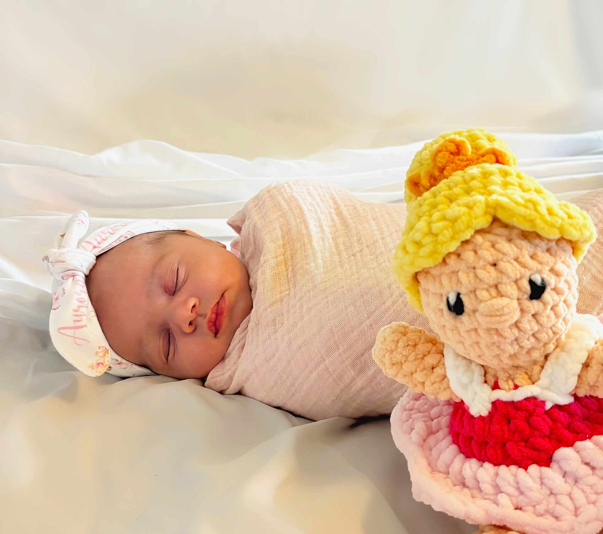 Aurora joined the competition — help win amazing prizes! newborn, baby, sleeping, swaddled, blanket, headband, doll, knitted, soft, pink, white, cute, toy, child, infant, peaceful, face, portrait, bed, cozy