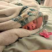 Aurora joined the competition — help win amazing prizes! baby, blanket, sleeping, pacifier, bed, soft, cozy, infant, child, face, wrapped, resting, comfort, indoors, cute, peaceful, young, portrait, warm, toddler