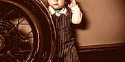 Camden joined the competition — help win amazing prizes! toddler, child, vintage_car, hat, pinstripe_suit, barefoot, wheel, oldtimer, sepia, portrait, curious, standing, retro, classic, vehicle, person, clothing, sidewalk, expression, nostalgic