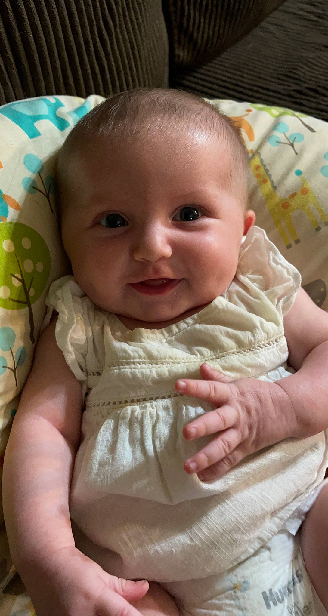 Addison is registered to the contest to win money with this photo: baby, baby_toddler_clothing, cheek, chin, comfort, eye, eyebrow, facial_expression, finger, gesture, head, human, iris, lip, mouth, nose, person, product, skin, sleeve