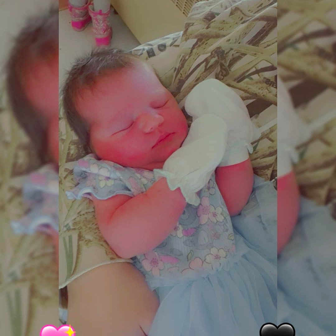 Areyah is registered to the contest to win money with this photo: baby, balloon, bed, bedroom, crib, cushion, face, furniture, head, heart, homedecor, indoors, infantbed, newborn, person, photography, portrait, quilt, room, sleeping