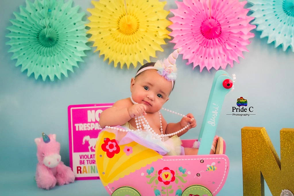 Nyonna joined the competition — help win amazing prizes! aqua, art, baby, baby_toddler_clothing, blue, event, font, fun, happy, headwear, magenta, paper_product, party_supply, person, pink, product, room, smile, textile, toddler