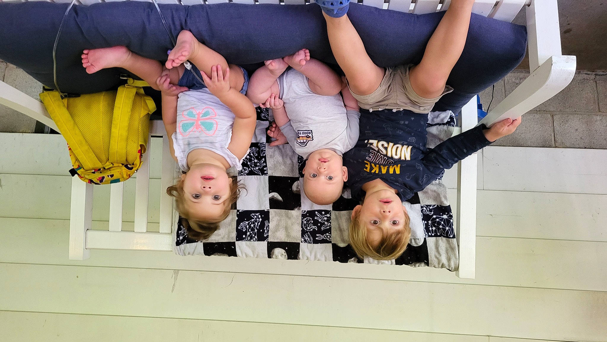 Noel is registered to the contest to win money with this photo: art, comfort, elbow, event, facial_expression, font, fun, gesture, happy, human_leg, knee, person, room, shorts, sleeve, smile, sportswear, t_shirt, team, thigh