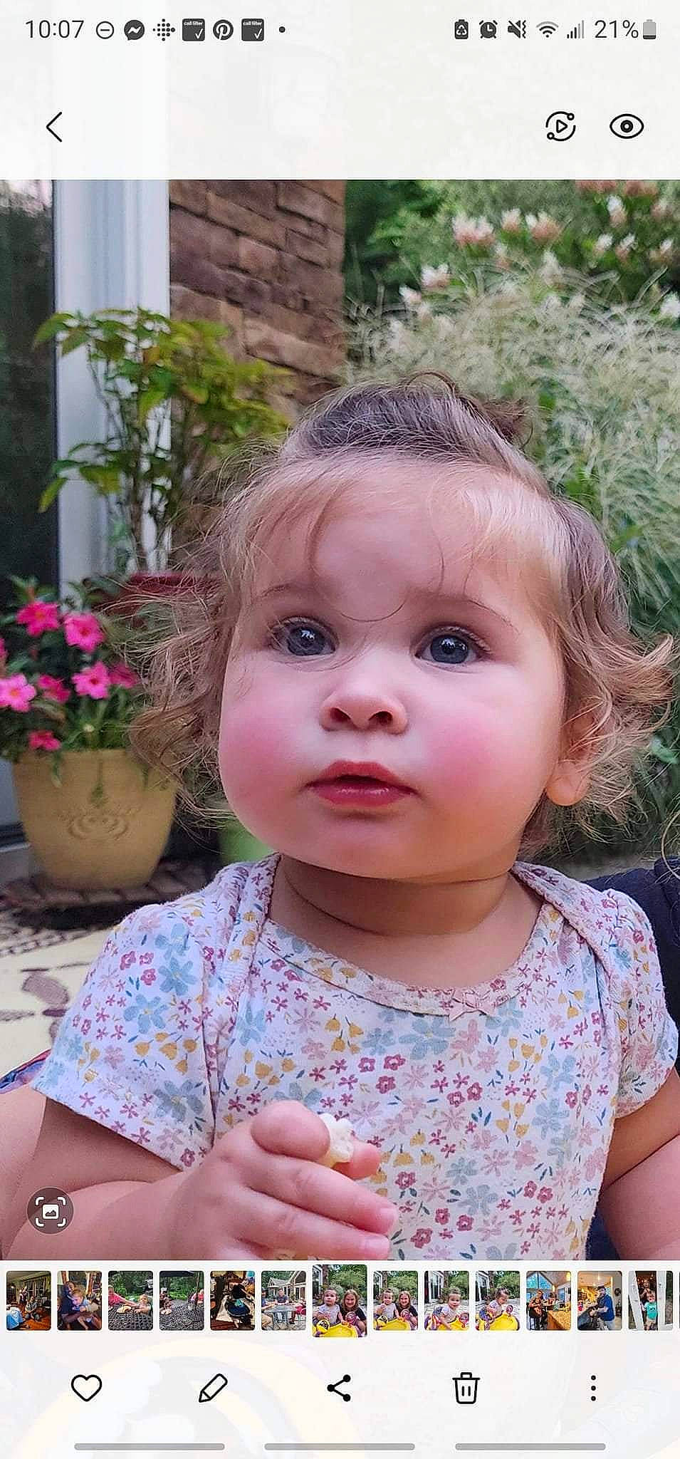 Noel is registered to the contest to win money with this photo: baby_toddler_clothing, cheek, child, chin, eyelash, flowerpot, grass, hairstyle, happy, head, houseplant, iris, lip, nose, person, photograph, pink, plant, skin, summer