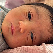 Alessia is registered to the contest to win money with this photo: baby, newborn, face, close_up, skin, blanket, pink, soft, hair, infant, portrait, lying_down, cozy, cute, sleepy, child, clothing, resting, toddler, newborn_baby