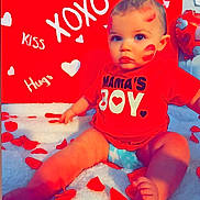 Luca joined the competition — help win amazing prizes! baby, child, infant, mamas_boy, red_shirt, diaper, lipstick_marks, rose_petals, valentine_background, xoxo_sign, kiss_text, heart_shapes, balloon, blanket, sitting, portrait, blue_eyes, chubby_legs, cute, studio_setup