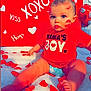 baby, child, infant, mamas_boy, red_shirt, diaper, lipstick_marks, rose_petals, valentine_background, xoxo_sign, kiss_text, heart_shapes, balloon, blanket, sitting, portrait, blue_eyes, chubby_legs, cute, studio_setup