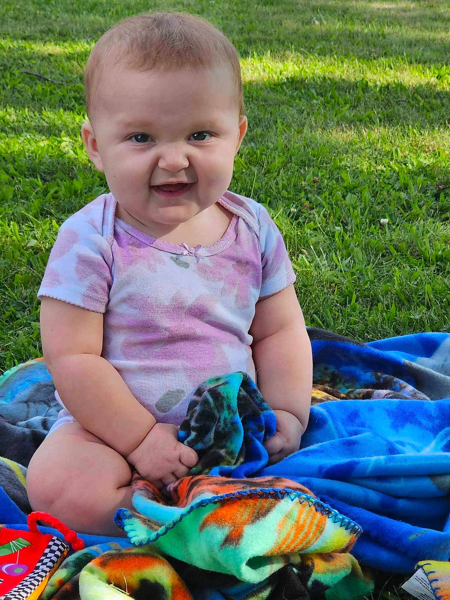 Sophia joined the competition — help win amazing prizes! baby, baby_toddler_clothing, child, fun, grass, green, happy, iris, joy, leaf, leisure, pattern, people_in_nature, person, play, recreation, sitting, skin, spring, summer