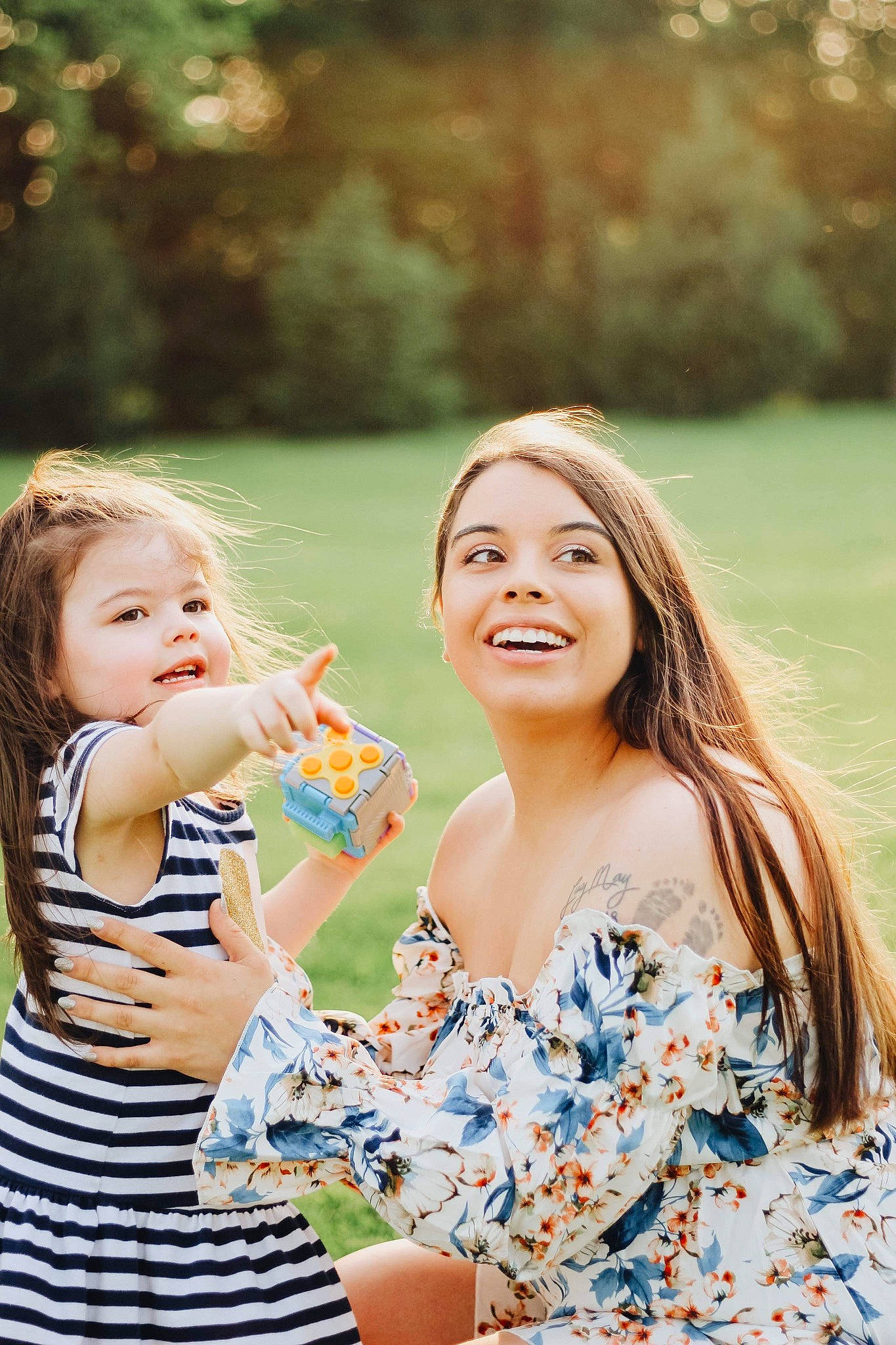 Lucy is registered to the contest to win money with this photo: dress, face, facial_expression, flash_photography, fun, gesture, grass, hairstyle, happy, head, joy, leisure, people, people_in_nature, person, plant, recreation, skin, smile, summer