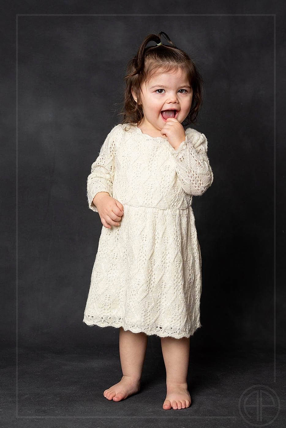 Lucy joined the competition — help win amazing prizes! arm, baby_toddler_clothing, cheek, child, day_dress, dress, embellishment, facial_expression, flash_photography, gesture, hair, happy, neck, one_piece_garment, pattern, person, skin, sleeve, smile, toddler