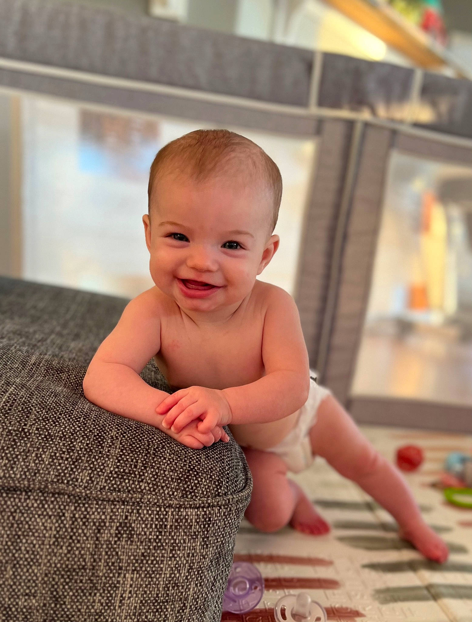Emerson joined the competition — help win amazing prizes! abdomen, baby, baby_toddler_clothing, cheek, chest, child, finger, floor, flooring, foot, fun, happy, hardwood, human_leg, joy, person, sitting, skin, sleeve, smile