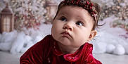Léonie a rejoint le concours — aidez-le/la à gagner de superbes lots ! baby, background, child, curious, cute, decorations, face, festive, floor, hands, headband, holiday, holiday_lights, indoors, infant, portrait, red_dress, seasonal, soft_lighting, winter