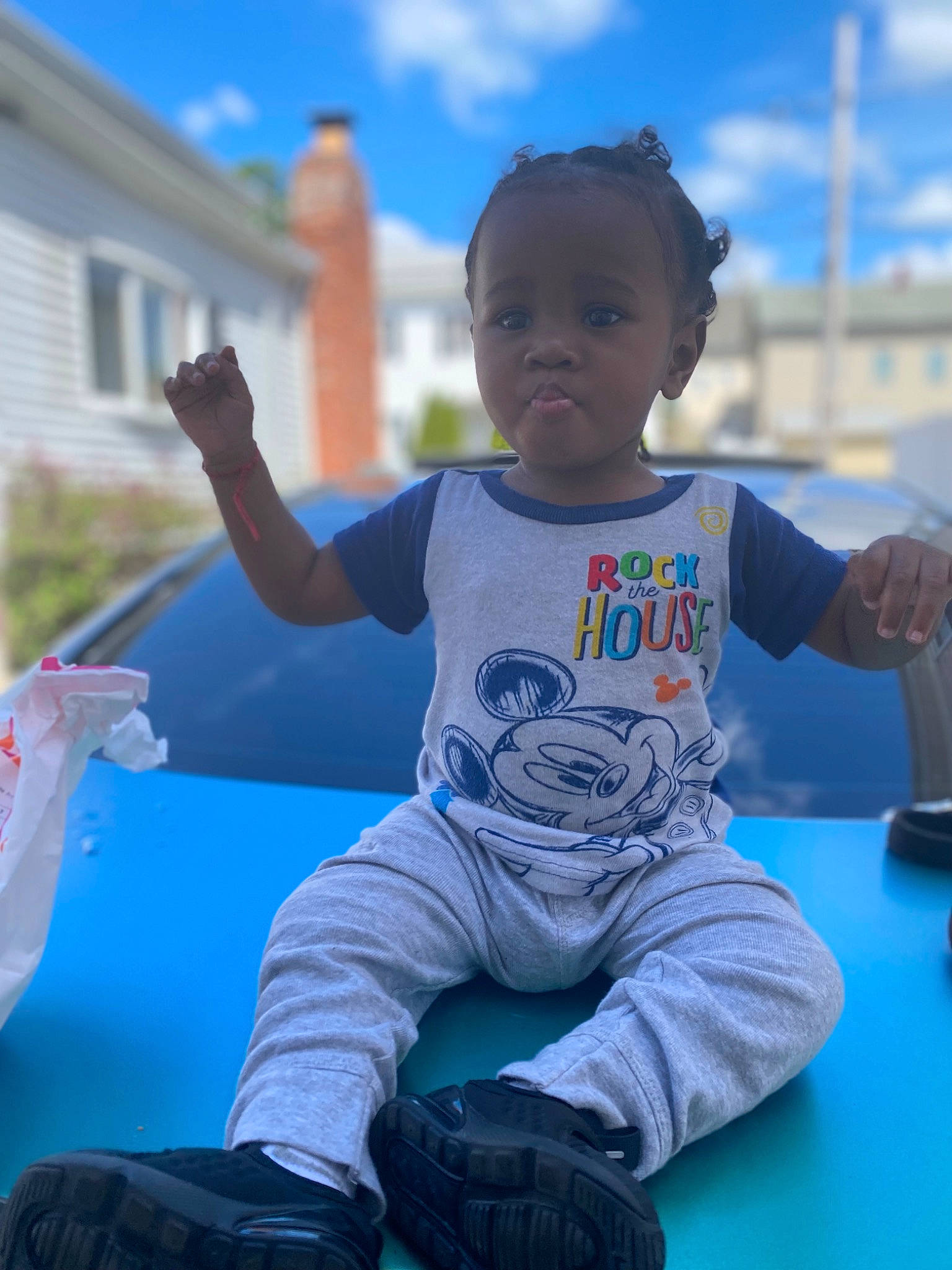 Azriel is registered to the contest to win money with this photo: baby, baby_toddler_clothing, cloud, cool, electric_blue, facial_expression, fun, grass, hairstyle, happy, leisure, people, person, recreation, sitting, sky, standing, t_shirt, toddler, travel